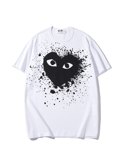 Comme des Garçons Play t-shirt featuring a heart splatter graphic