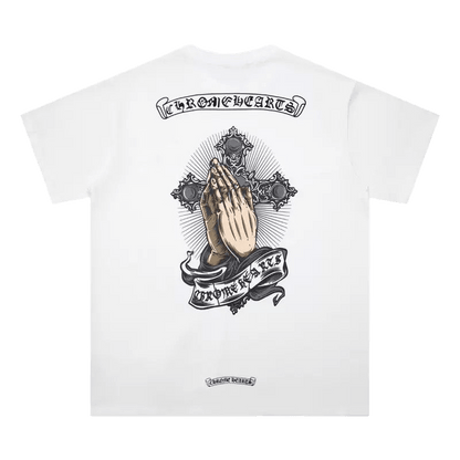 Chrome Hearts t-shirt featuring a print of praying hands on a cross.