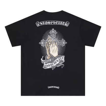 Chrome Hearts t-shirt featuring a print of praying hands on a cross.