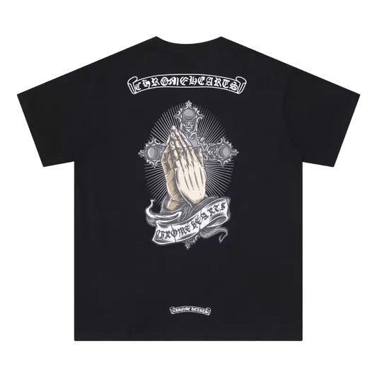 Chrome Hearts t-shirt featuring a print of praying hands on a cross.